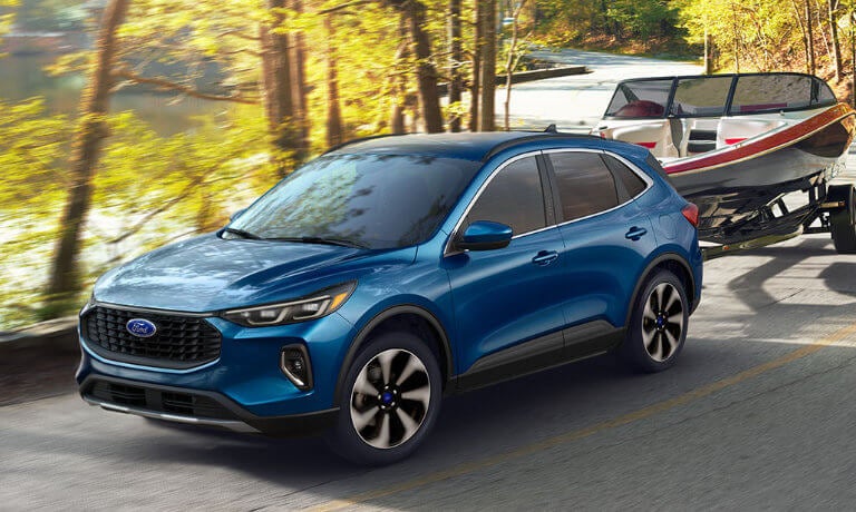 2025 Ford Escape towing a boat