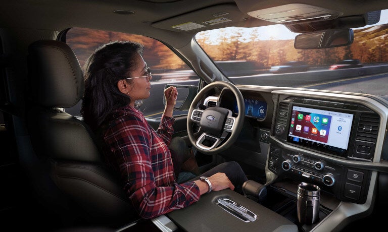 2025 Ford F-150 interior front with hands-off driver